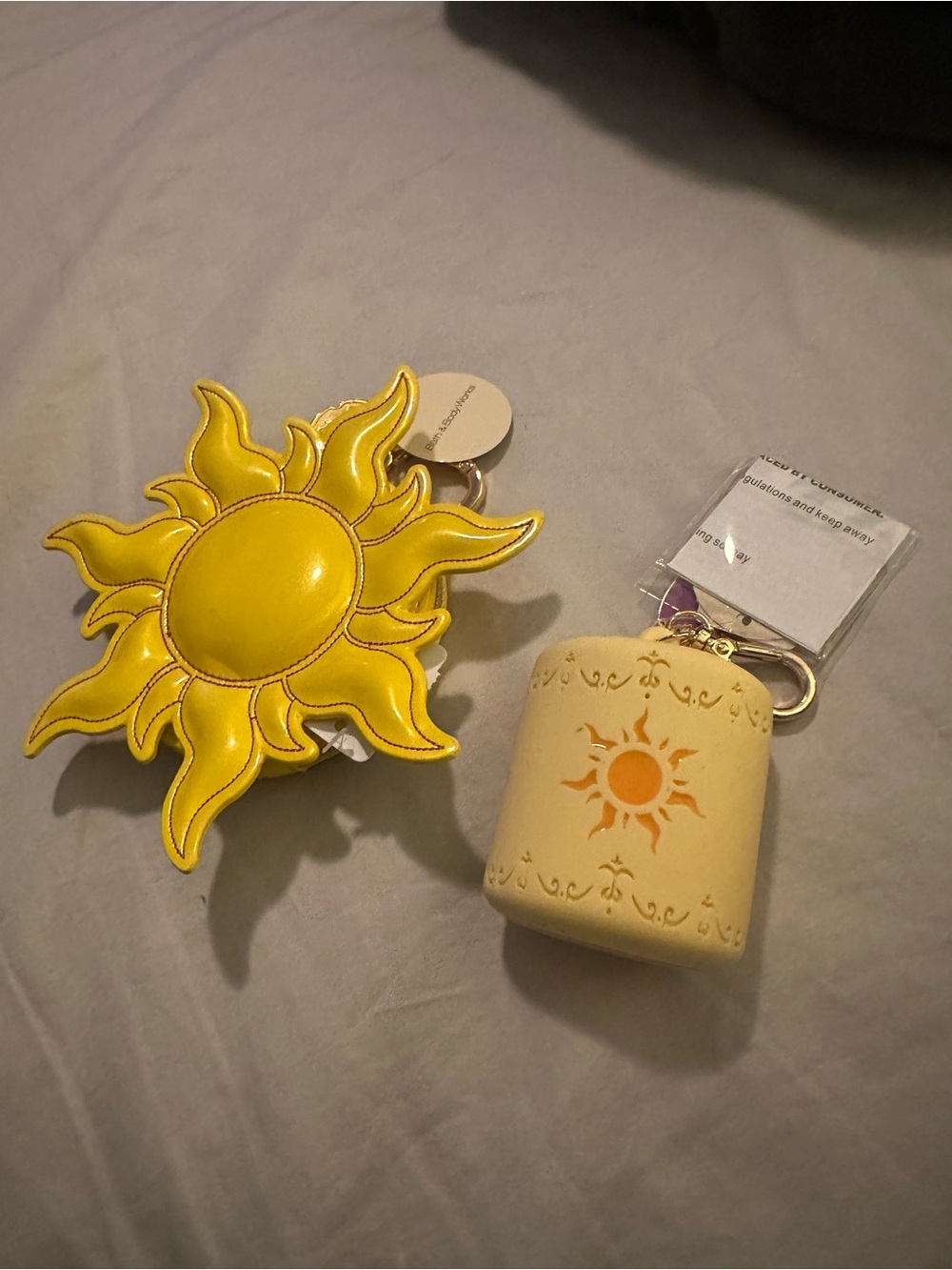 Rapunzel key chain purse and hand sanitizer holder from the disney collection